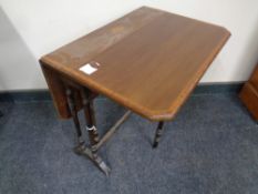 A Victorian style inlaid mahogany Sutherland table,