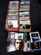 Two boxes containing seven inch singles, Elton John,