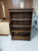 A set of oak open bookshelves