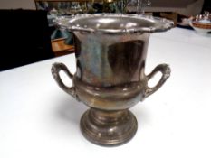 A silver plated twin handled wine cooler