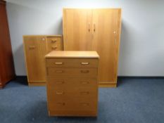 A mid 20th century G Plan E Gomme designed three piece bedroom suite comprising of double door