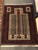 An Afghan prayer rug 131 x 100 cm