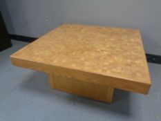 A square oak mosaic topped coffee table,