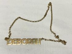 A 9ct gold necklace with named 