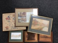 A box containing two copper plaques depicting HMS Invincible and HMS Glasgow,