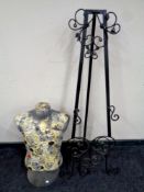 A folding wrought metal easel together with a dressmaker's torso on stand