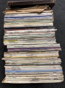 A box containing vinyl LPs to include Slim Whitman, Jim Reeves, The Seekers,