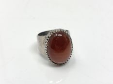 A Scottish silver cabochon agate ring