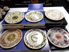 A box containing a quantity of boxed Wedgwood calendar plates