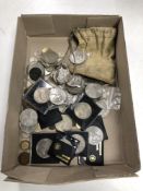 A collection of coins to include commemorative crowns, six pence pieces,