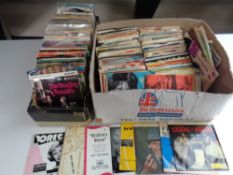 Two boxes of a large quantity of mid 20th century vinyl 7