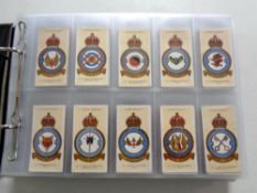 An album containing a large quantity of John Player cigarette cards, national flags, film stars,