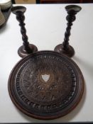 An Edwardian carved oak card tray together with a pair of barley twists candlesticks