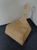 A wicker rocking chair
