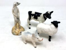 A Beswick china figure : Fresian Calf, model 1249, black and white, gloss, height 7 cm,
