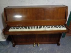 A mahogany cased Consolette overstrung mini piano