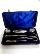 A cased six piece silver manicure set,