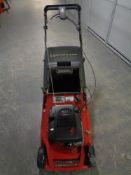 A Lawnflite four horsepower 6 speed self propelled petrol lawn mower with grass box