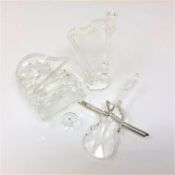 Three Swarovski crystal figures, a grand piano with stool,