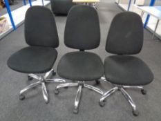 Three swivel adjustable typist's chairs