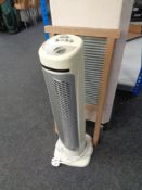 A tower fan and a vintage wash board