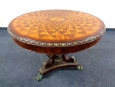 A good quality Regency style mahogany and parcel gilt circular pedestal drum table,