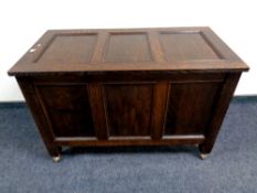 An oak panelled blanket box