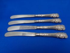 Four silver handled cake knives
