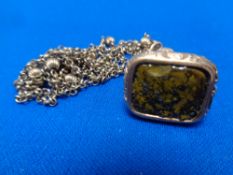 An antique style fob on gold plated chain