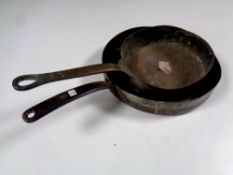 Two early 19th century copper cast iron handled pans