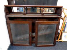 A 19th century mahogany glazed door bookcase base