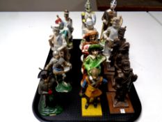 A tray containing fifteen assorted figures, soldiers, to include ceramic,