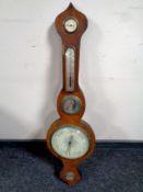 An antique mahogany barometer