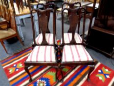 A set of four Queen Anne style dining chairs