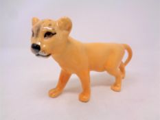 A Beswick figure, lion cub facing left no.