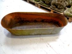 A galvanised tin bath