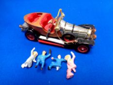 A Corgi Toys Chitty Chitty Bang Bang die cast vehicle with figures