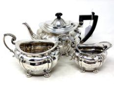 A silver three piece tea service, Josiah Williams & Co, London 1900, engraved with an inscription,
