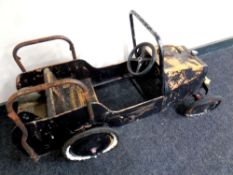 A 1930s tin plate child's car