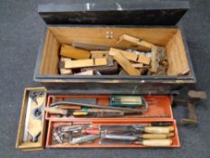 A vintage pine joiner's tool box containing a good selection of joinery tools including planes,