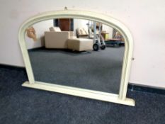 A contemporary overmantel mirror