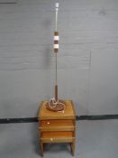 A nest of three 20th century Sunelm teak tables and a 1970's standard lamp