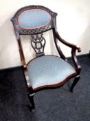 A 19th century mahogany armchair on cabriole legs