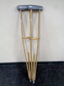 A pair of wooden crutches