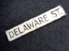 A metal street sign,