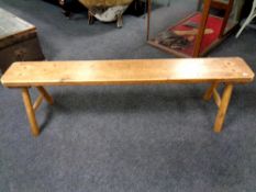 A rustic pine bench,