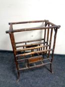 An early 20th century bamboo magazine rack