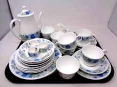 A tray containing 26 pieces of Wedgwood Clementine bone tea china