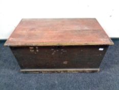 An antique pine blanket box,