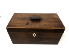 A George III mahogany tea caddy with glass bowl